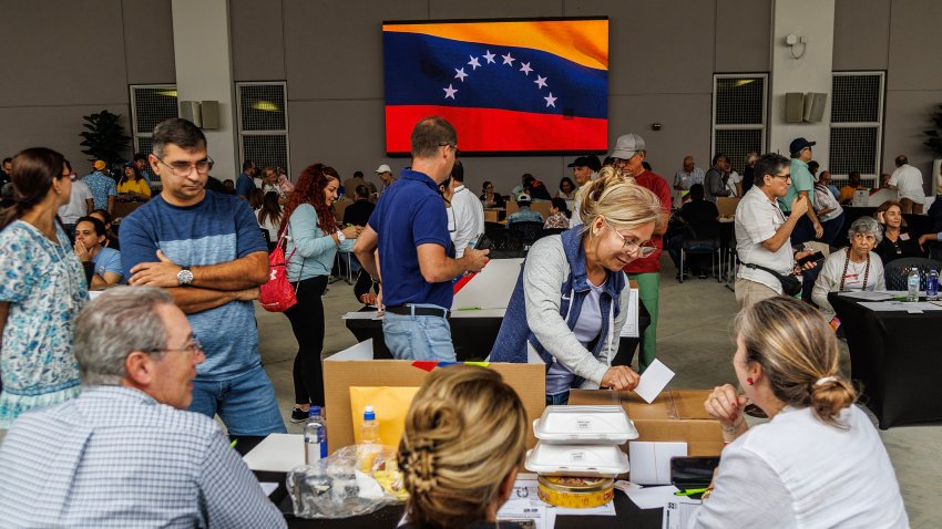 Venezuelans vote in the primary elections to chose the opposition candidate for next year’s presidential election at the Miami Dade College West Campus in Doral, Florida, on Oct. 22, 2023. (Pedro Portal/Miami Herald/Tribune News Service via Getty Images)